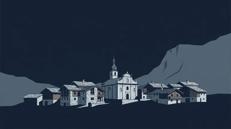 Val d’Isère village at night, with its church and chalets beneath the mountains